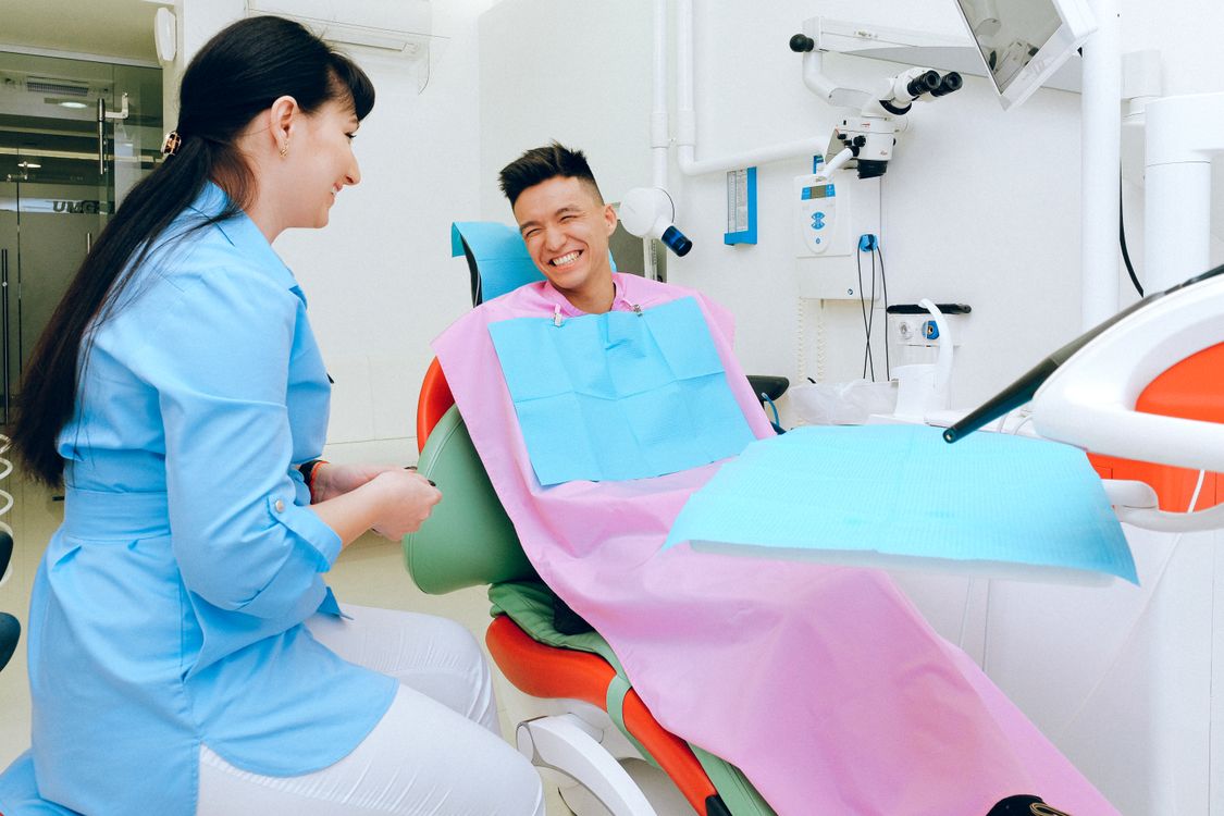 Dentist with a smiling patient