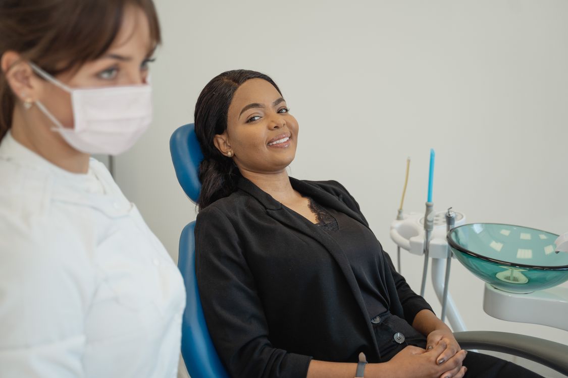 Smiling patient in the dental chair